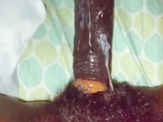 Meaty fake penis inwards ebony wooly wet cunny